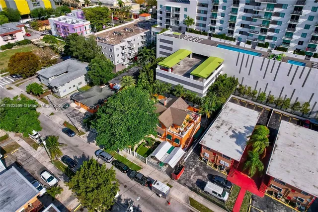 an aerial view of a house with a garden