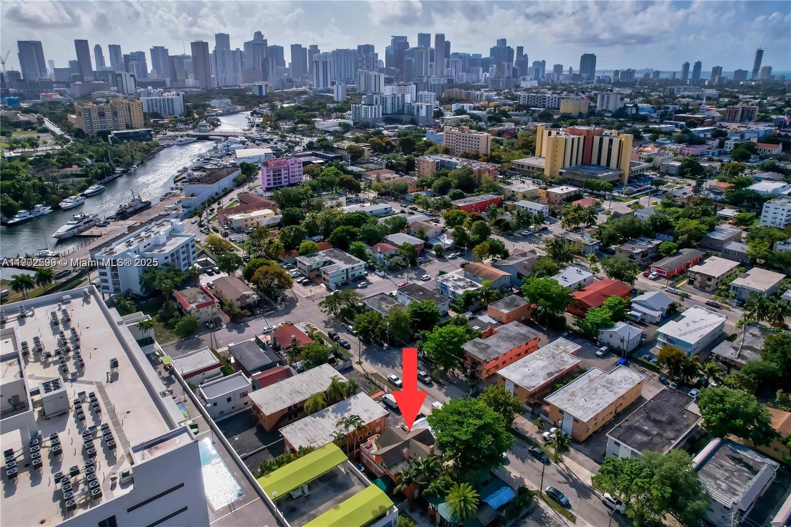 1033 Northwest 6 Street, Unit A Miami, FL 33136 - Photo 34 of 35 an aerial view of a city with lots of residential buildings