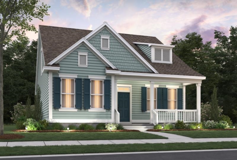 View of front of property with covered porch and a shingled roof