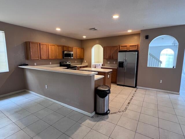 13922 Southwest 278th Street Homestead, FL 33032 - Photo 103 of 133 a kitchen with stainless steel appliances granite countertop a sink counter space cabinets and a large window