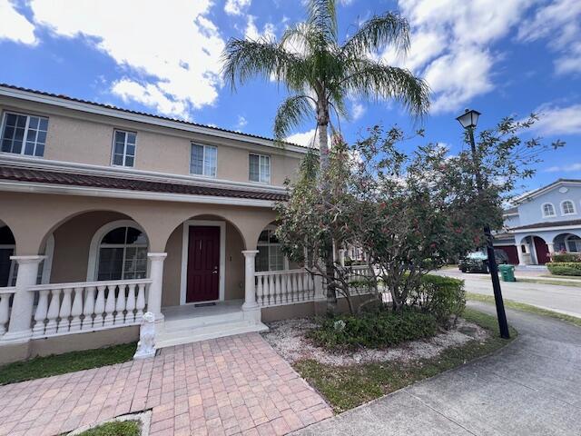 13922 Southwest 278th Street Homestead, FL 33032 - Photo 121 of 133 a front view of a house with a garden