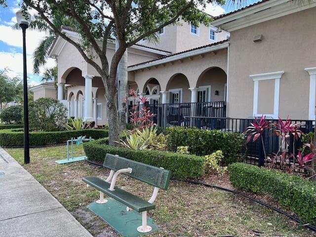 13922 Southwest 278th Street Homestead, FL 33032 - Photo 123 of 133 a front view of a house with garden