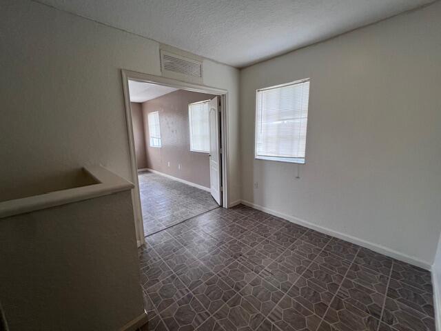 13922 Southwest 278th Street Homestead, FL 33032 - Photo 17 of 133 an empty room with windows and closet