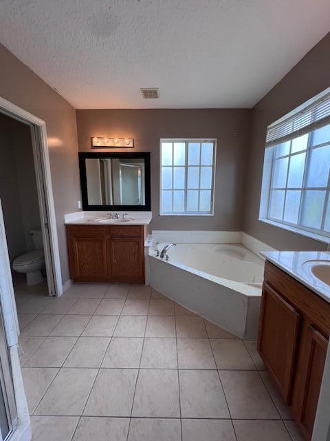 13922 Southwest 278th Street Homestead, FL 33032 - Photo 23 of 133 a bathroom with a bathtub and a sink