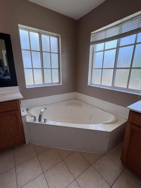 13922 Southwest 278th Street Homestead, FL 33032 - Photo 28 of 133 a bath tub sitting in a bathroom next to a window