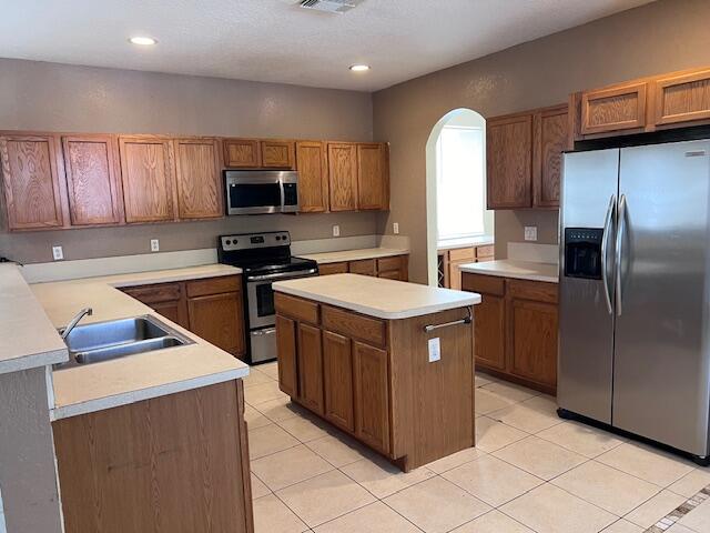 13922 Southwest 278th Street Homestead, FL 33032 - Photo 81 of 133 a kitchen with a stove sink and a microwave