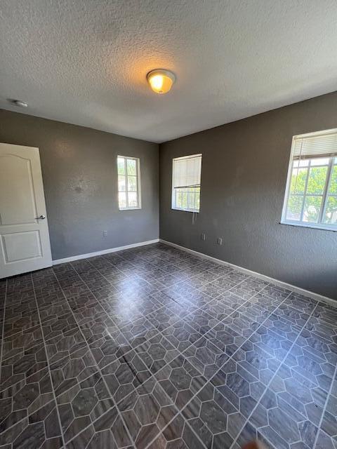13922 Southwest 278th Street Homestead, FL 33032 - Photo 89 of 133 an empty room with windows and closet