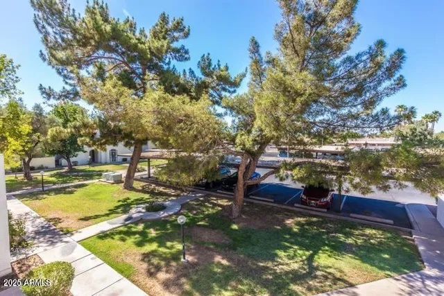 a view of swimming pool with a patio