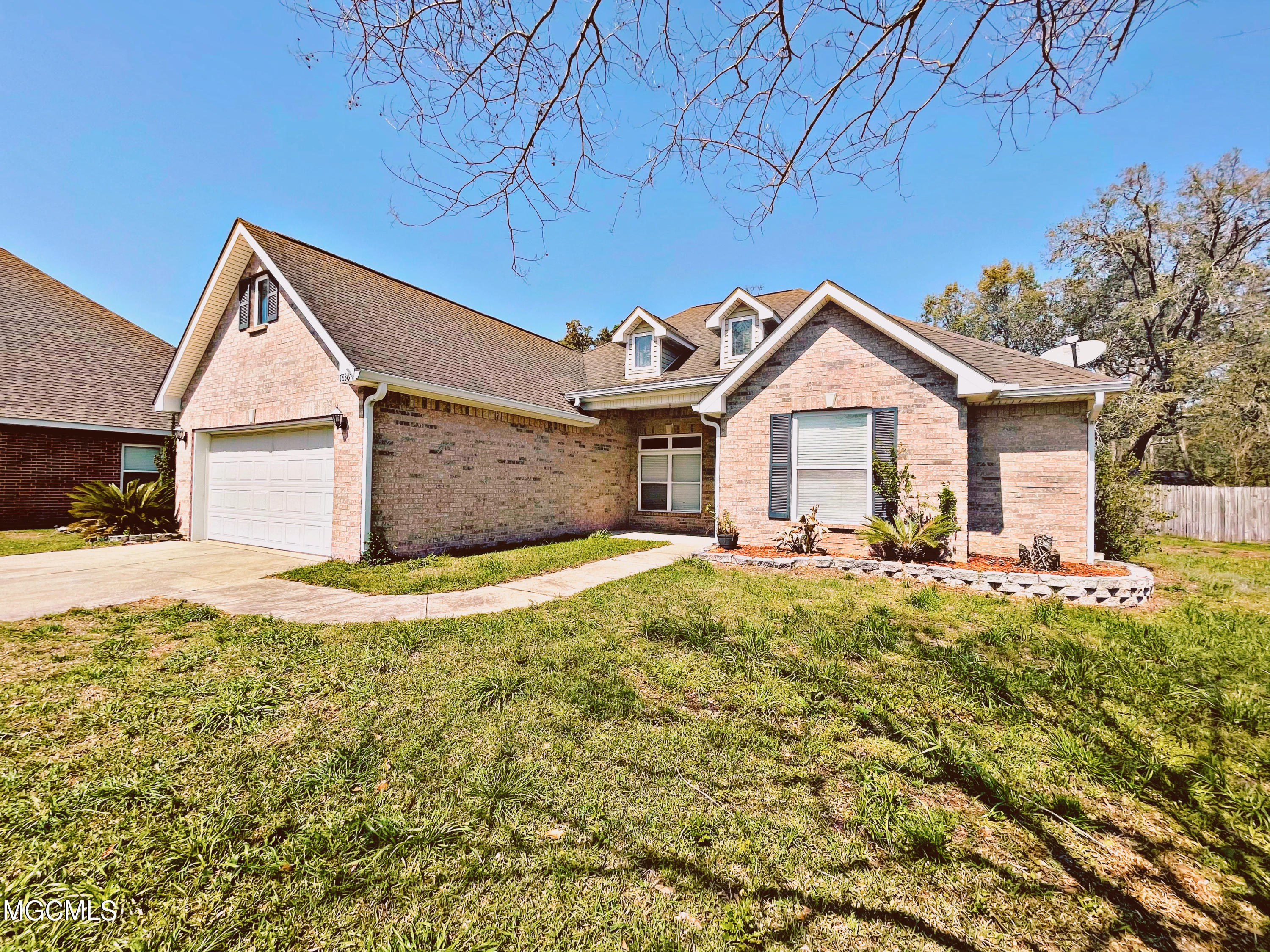 7836 Rue Ramsey Ocean Springs, MS 39564 - Photo 3 of 25 Front Right