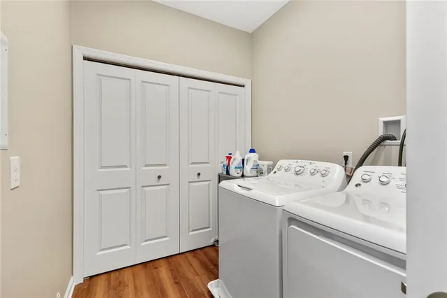 a utility room with dryer and washer
