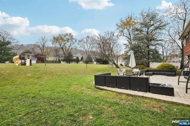 a view of a garden with houses