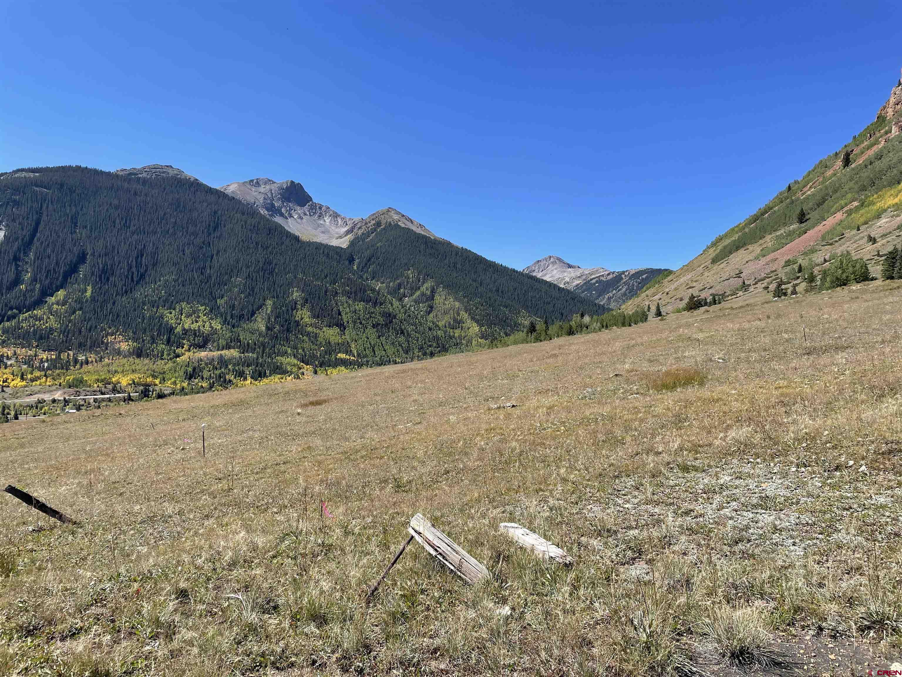 10-th Keystone Street Silverton, CO 81433 - Photo 2 of 7 a view of a dry yard with mountains in the background