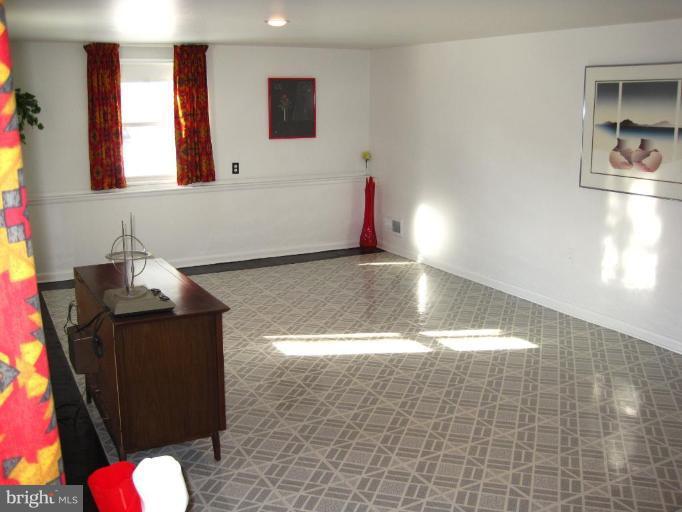 7905 Liberty Road Windsor Mill, MD 21244 - Photo 9 of 13 a view of a living room with a sink