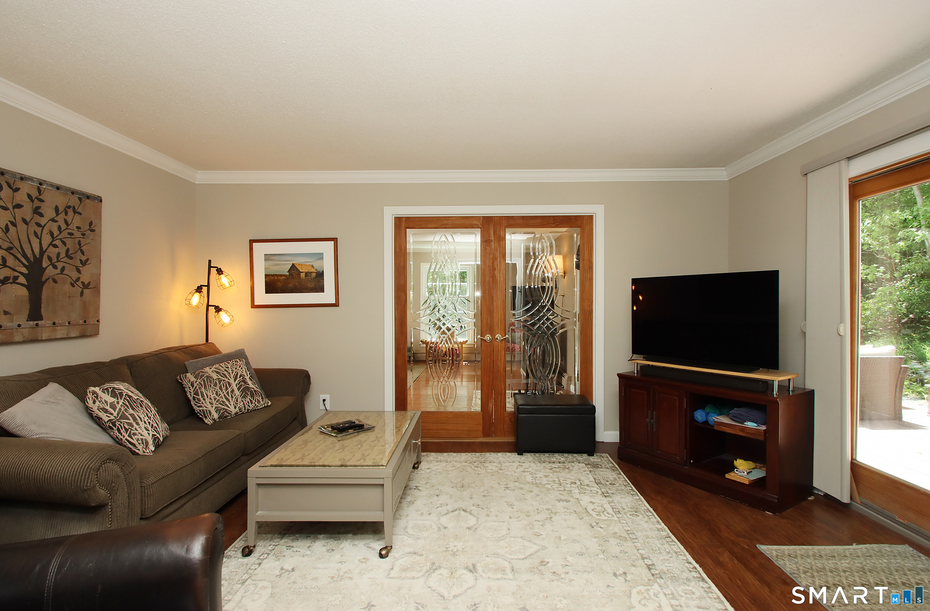 19 Legendary Road East Lyme, CT 06333 - Photo 13 of 38 Den with glass doors to Living room and deck area