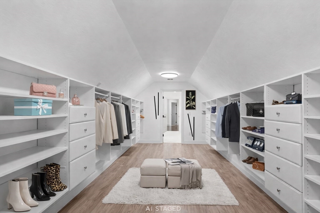 5 Greenbriar Lane Bellingham, MA 02019 - Photo 12 of 26 a view of walk in closet with clothes and shoes
