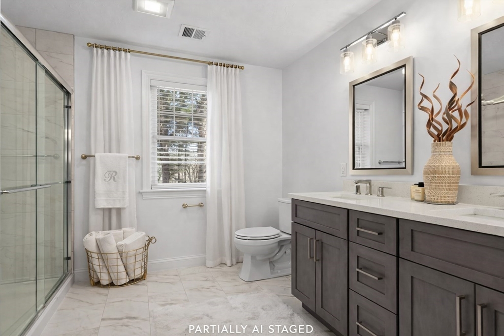 5 Greenbriar Lane Bellingham, MA 02019 - Photo 13 of 26 a bathroom with a toilet sink and mirror