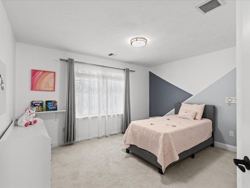 5 Greenbriar Lane Bellingham, MA 02019 - Photo 15 of 26 a bedroom with a bed and a window