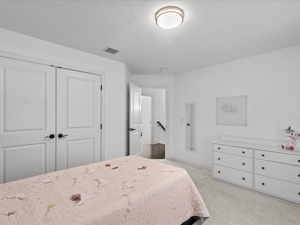 5 Greenbriar Lane Bellingham, MA 02019 - Photo 16 of 26 a spacious bedroom with a bed and a cabinets