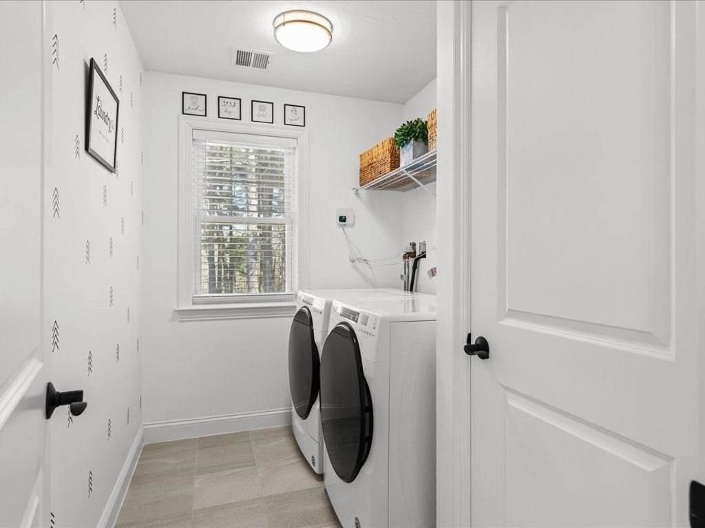 5 Greenbriar Lane Bellingham, MA 02019 - Photo 17 of 26 a utility room with window dryer and washer