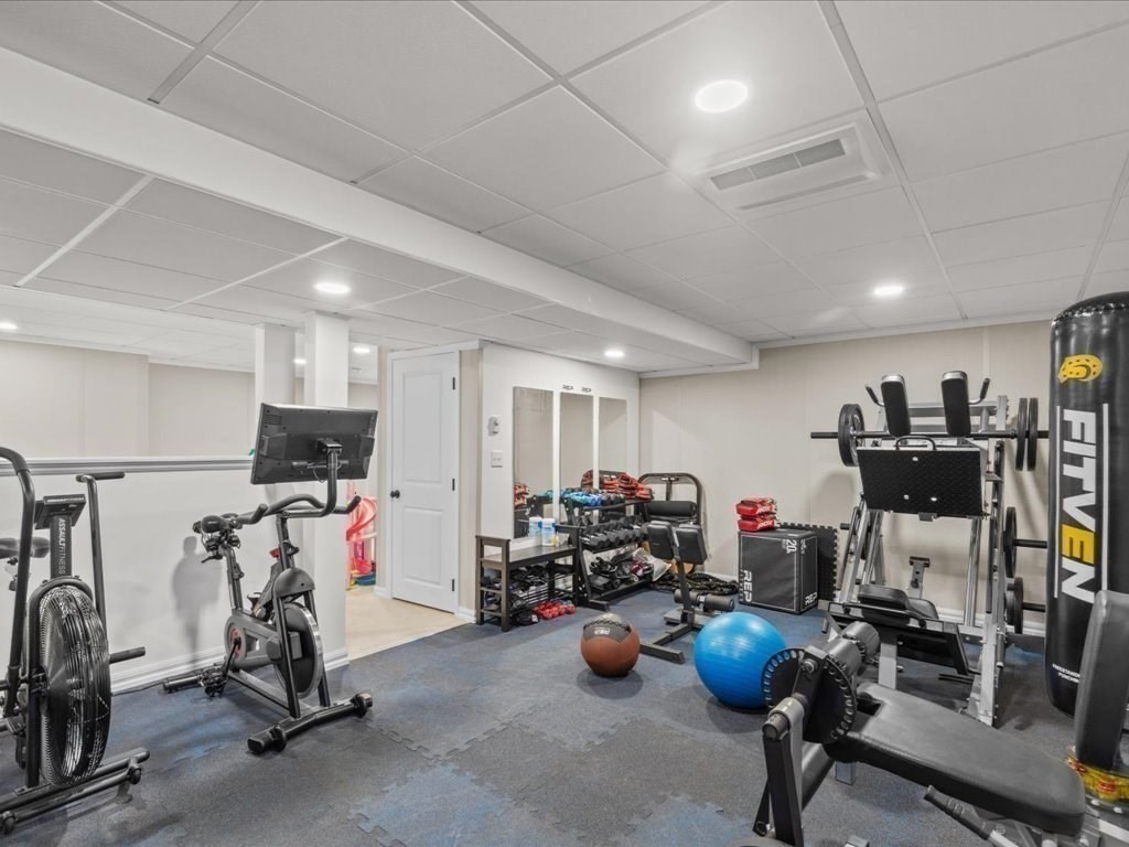 5 Greenbriar Lane Bellingham, MA 02019 - Photo 18 of 26 a view of a room with gym equipment