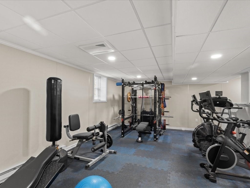 5 Greenbriar Lane Bellingham, MA 02019 - Photo 19 of 26 a view of a room with gym equipment
