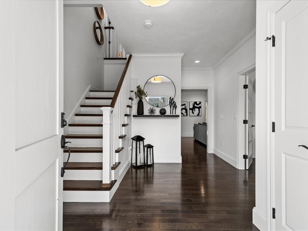 5 Greenbriar Lane Bellingham, MA 02019 - Photo 2 of 26 a view of a living room with furniture and entryway
