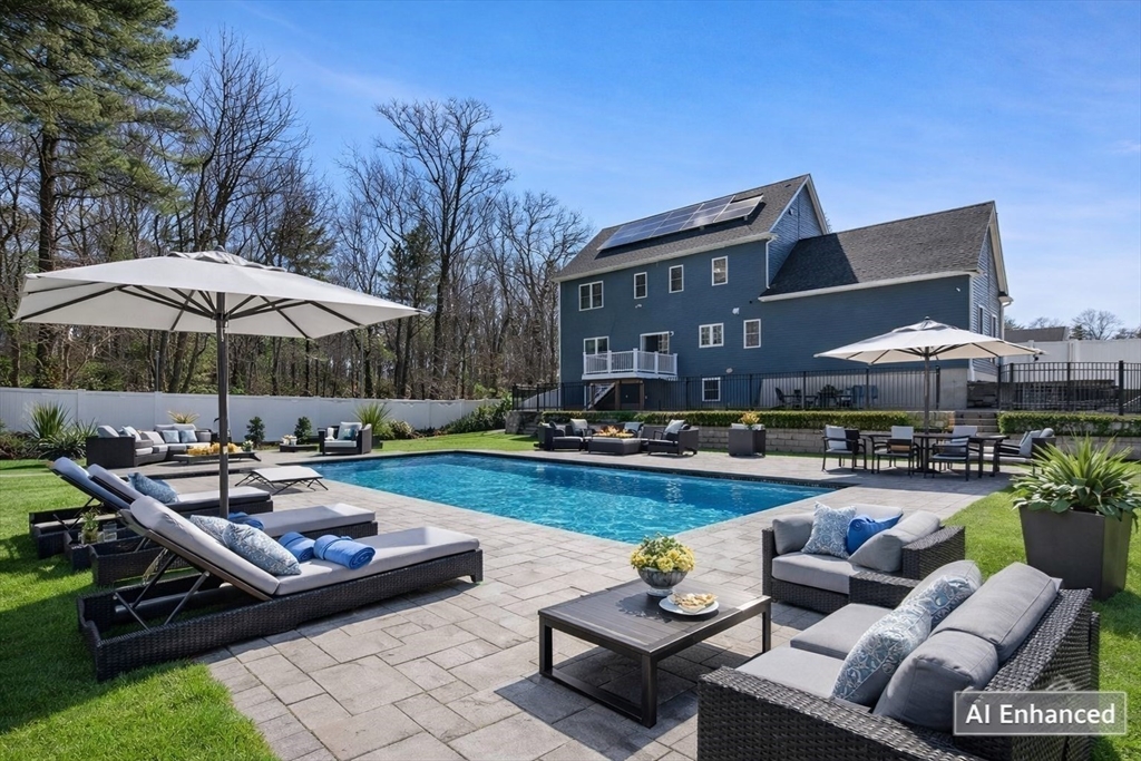 5 Greenbriar Lane Bellingham, MA 02019 - Photo 21 of 26 a view of a swimming pool with lounge chairs in patio