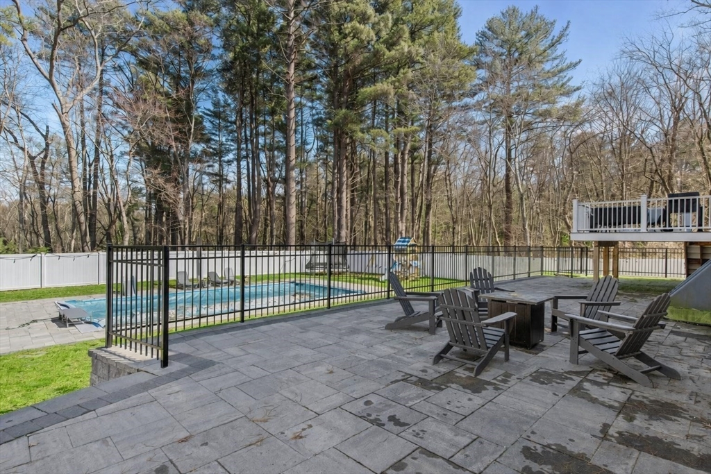 5 Greenbriar Lane Bellingham, MA 02019 - Photo 23 of 26 a view of a house with backyard and sitting area