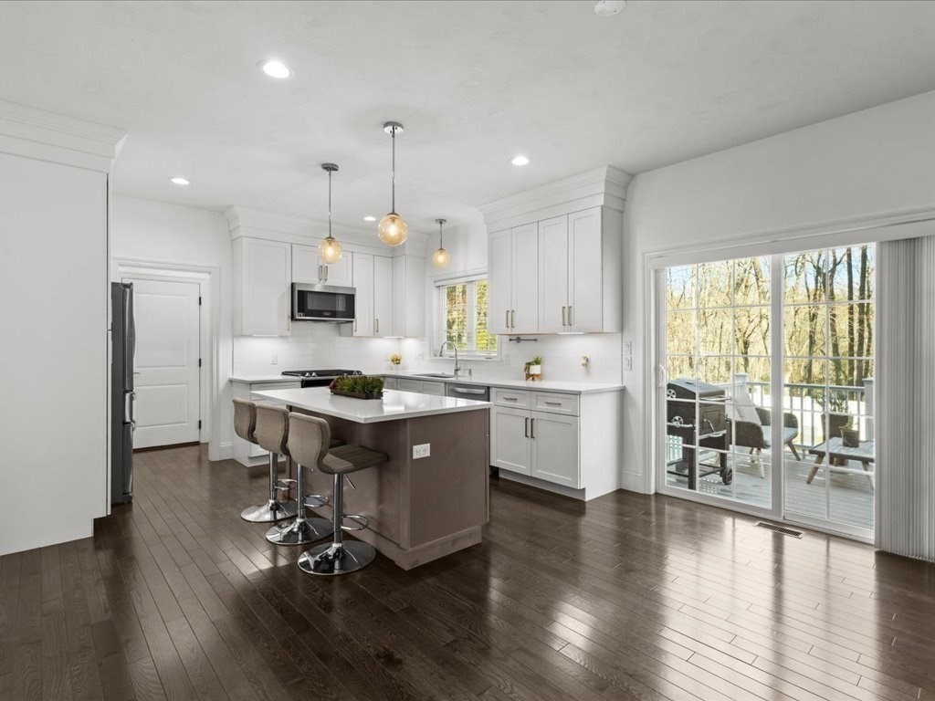 5 Greenbriar Lane Bellingham, MA 02019 - Photo 6 of 26 a kitchen with a counter top appliances and a window