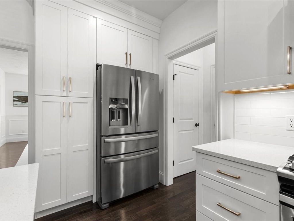 5 Greenbriar Lane Bellingham, MA 02019 - Photo 8 of 26 a kitchen with a refrigerator and a stove top oven