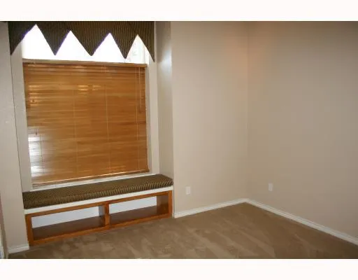 a bathroom with a sink and a shower curtain