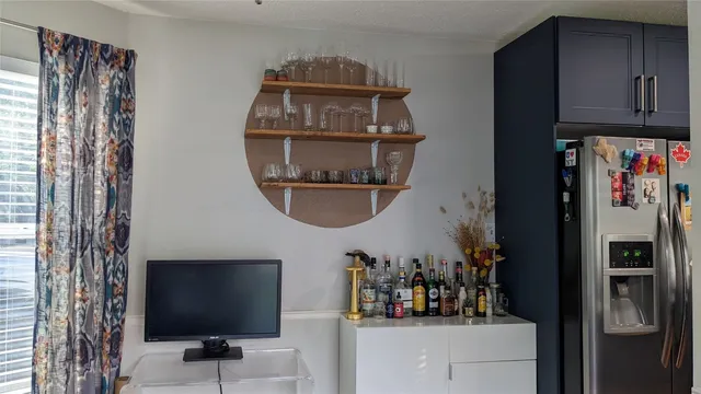 a view of a workspace with furniture