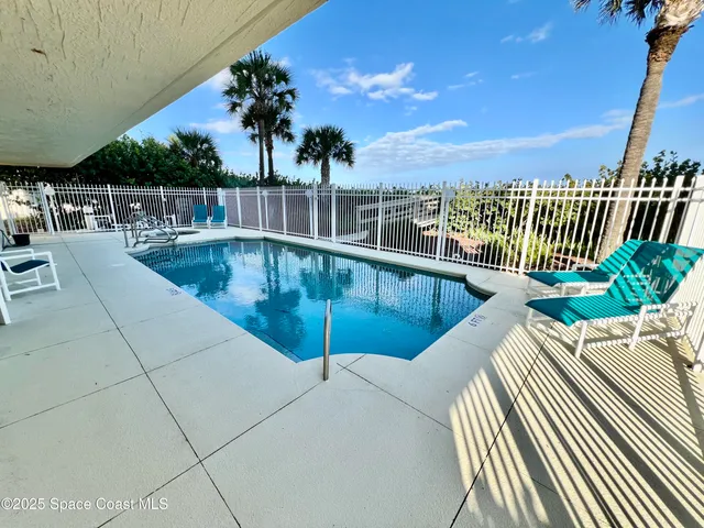 a view of a kitchen with a sink