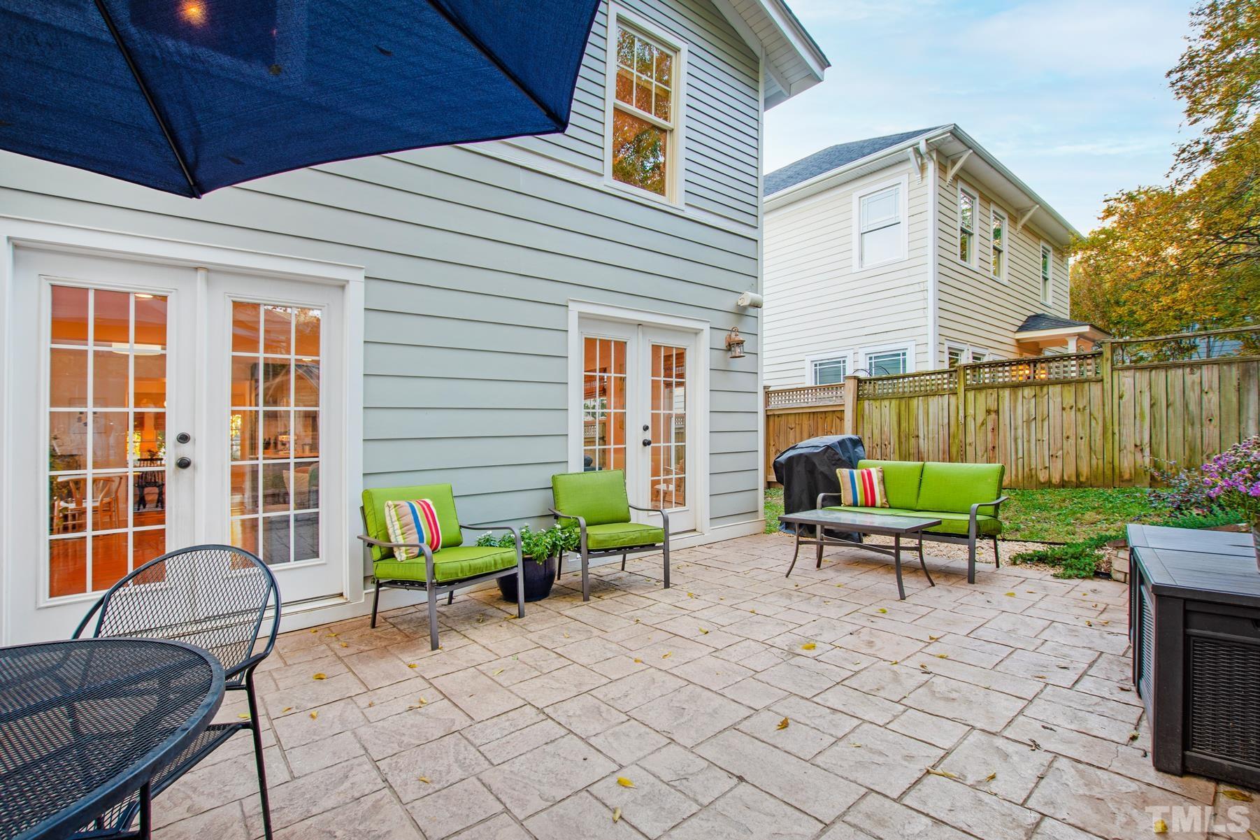308 Perry Street Raleigh, NC 27608 - Photo 29 of 30 a backyard of a house with outdoor seating
