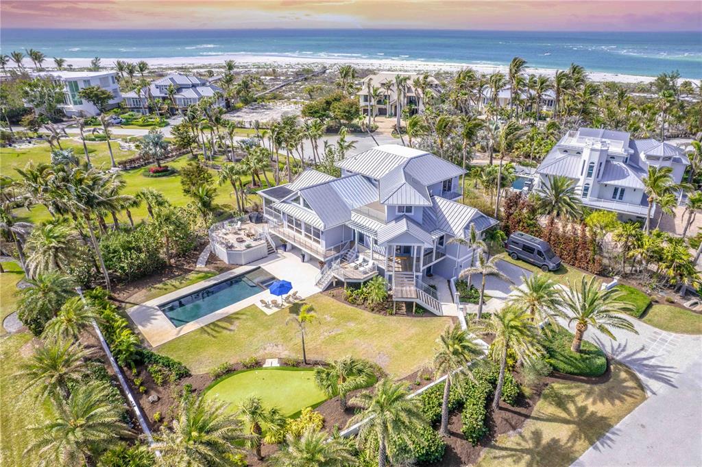 16250 Sunset Pines Circle Boca Grande, FL 33921 - Photo 2 of 48 an aerial view of residential houses with outdoor space