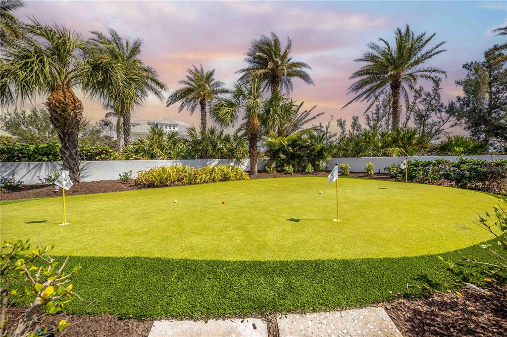16250 Sunset Pines Circle Boca Grande, FL 33921 - Photo 34 of 48 a view of a swimming pool and a chair