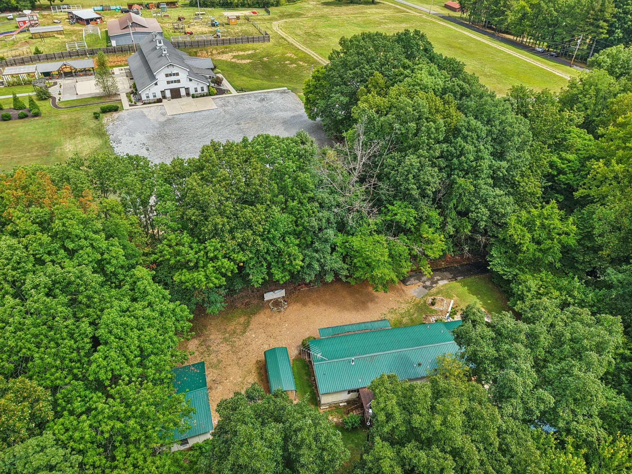 7498 Swift Road Greenbrier, TN 37073 - Photo 59 of 69 an aerial view of a house with a yard and lake view