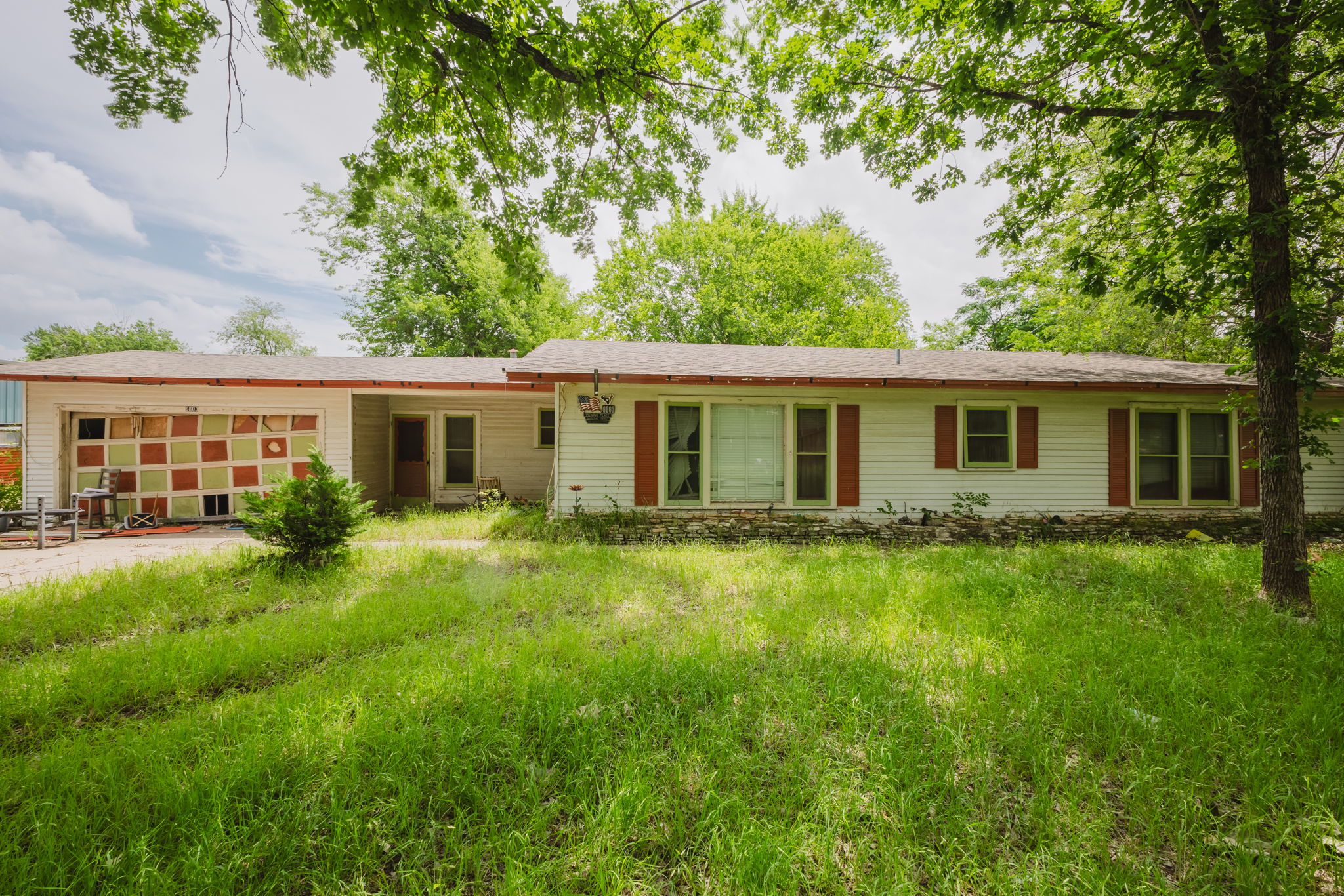 6803 Viewing Place Austin, TX 78719 - Photo 1 of 20 A well-established residence nestled amongst mature trees, offering a private setting.