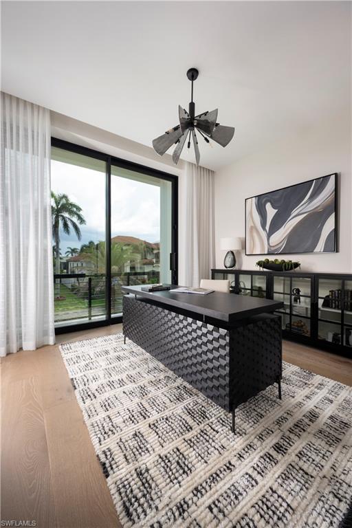 141 Channel Drive Naples, FL 34108 - Photo 12 of 28 Office space with wood finished floors and a ceiling fan