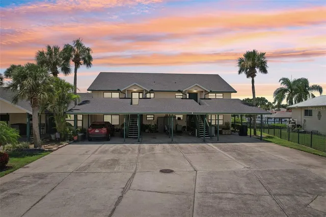 a view of a building with a garden area