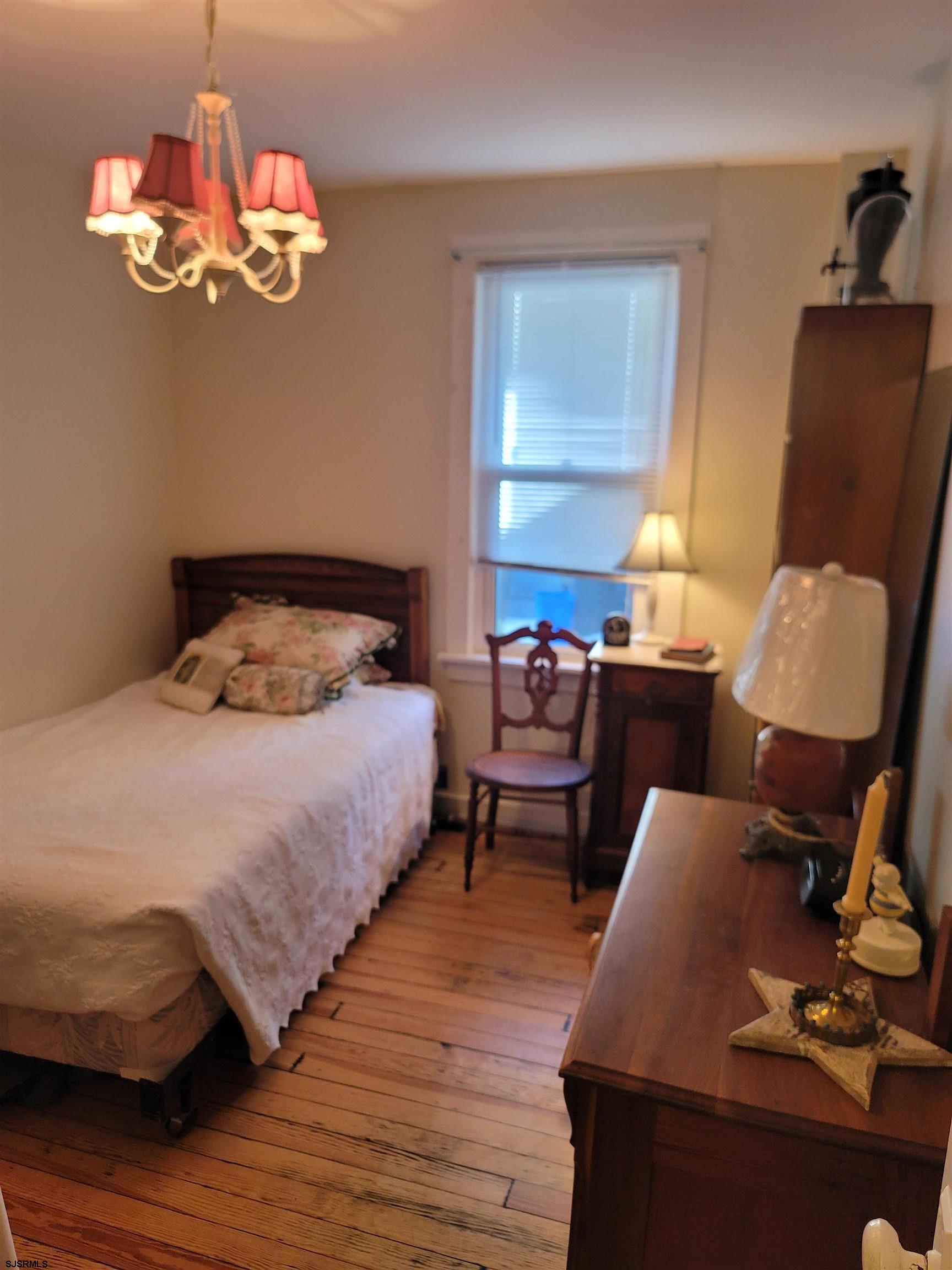 804 2nd Street Somers Point, NJ 08244 - Photo 15 of 29 a bedroom with a bed and furniture