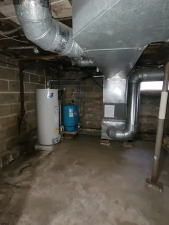 a view of an empty room with a fireplace