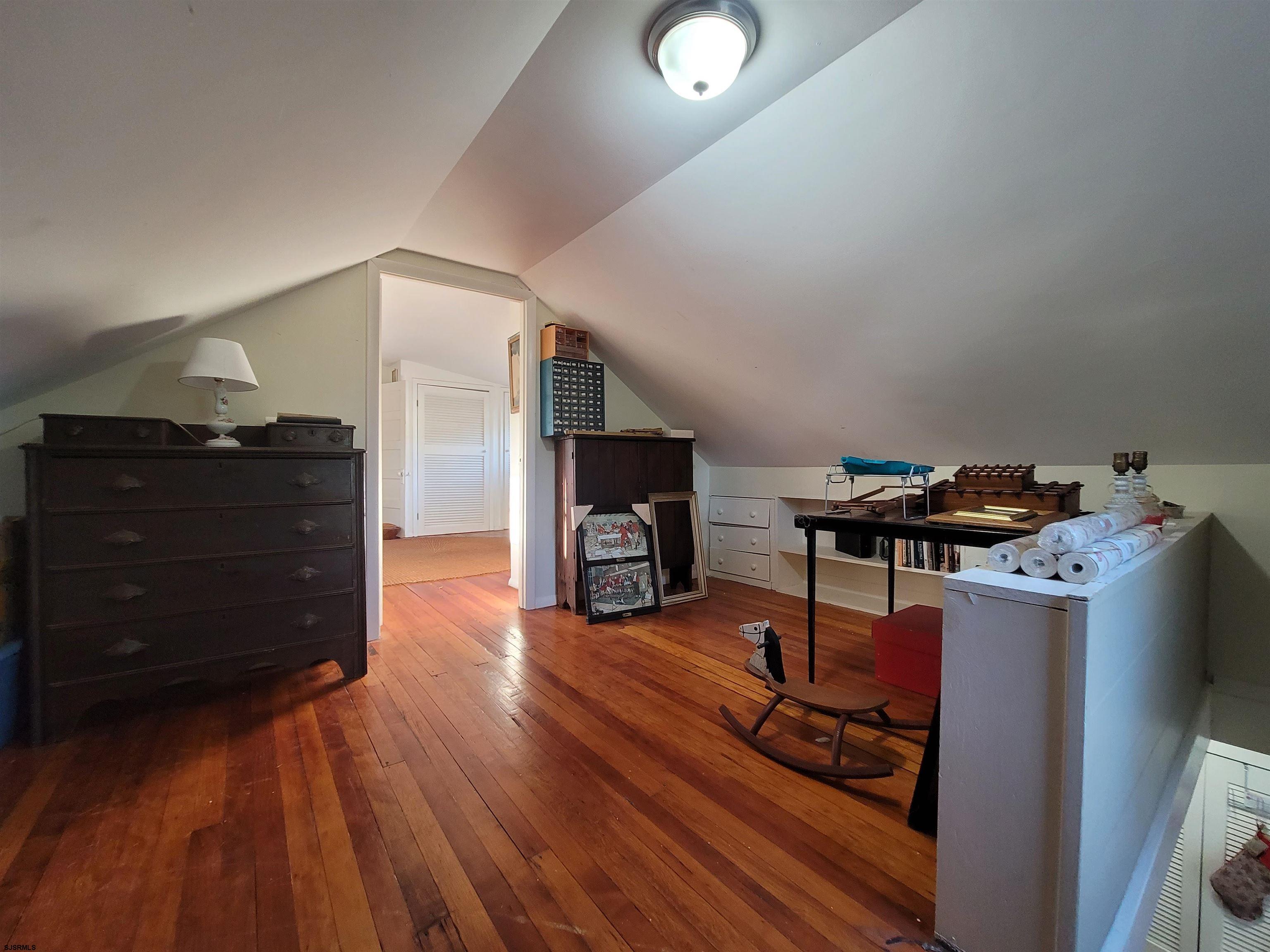 804 2nd Street Somers Point, NJ 08244 - Photo 17 of 29 a living room with furniture and a wooden floor