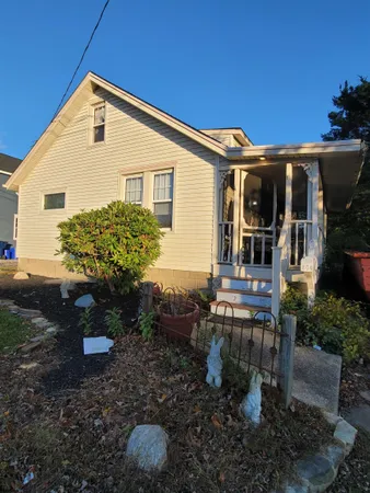 a front view of house with a yard