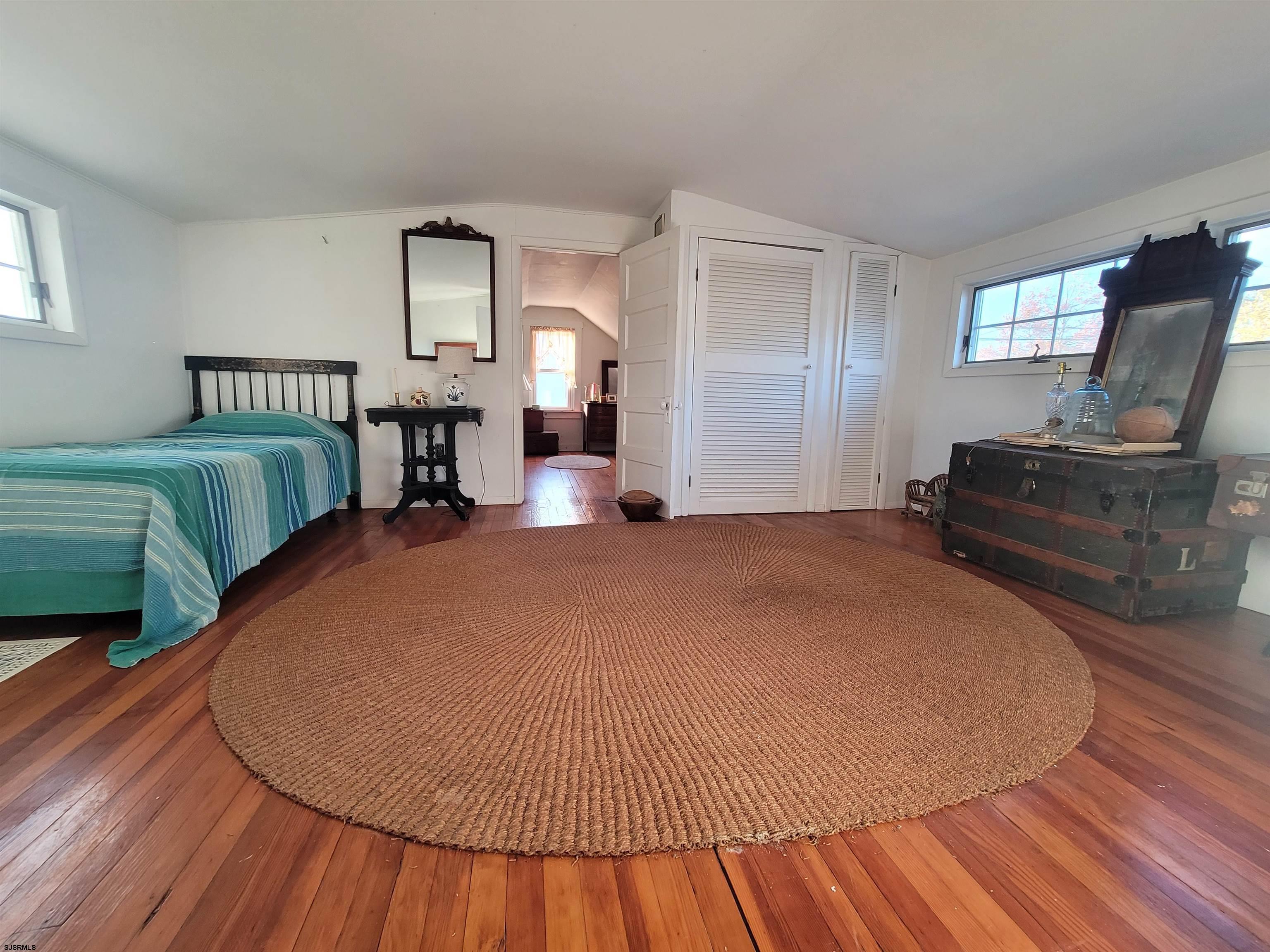 804 2nd Street Somers Point, NJ 08244 - Photo 18 of 29 a bed room with two beds and a chair