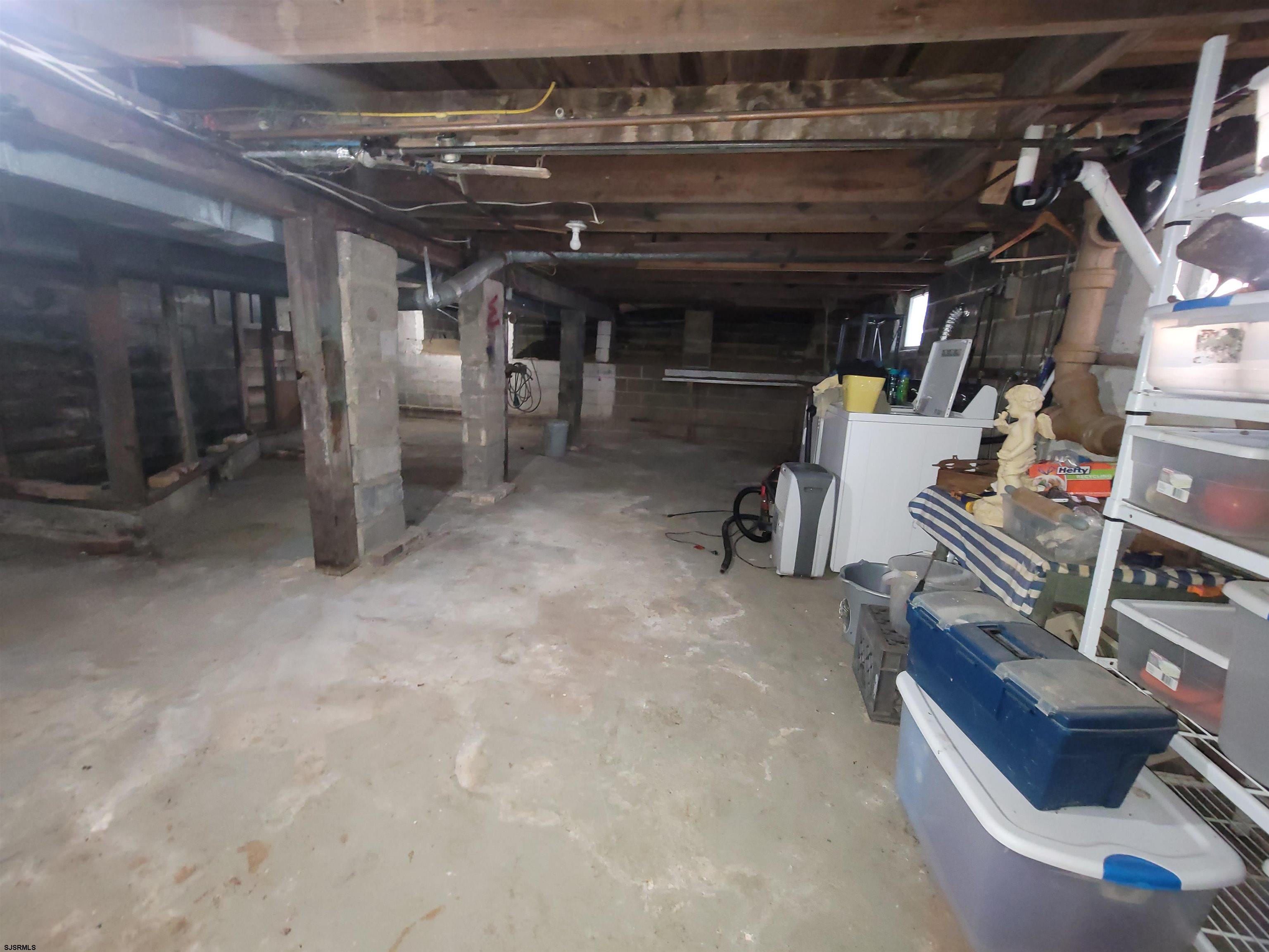 804 2nd Street Somers Point, NJ 08244 - Photo 22 of 29 a view of a storage room with shelves