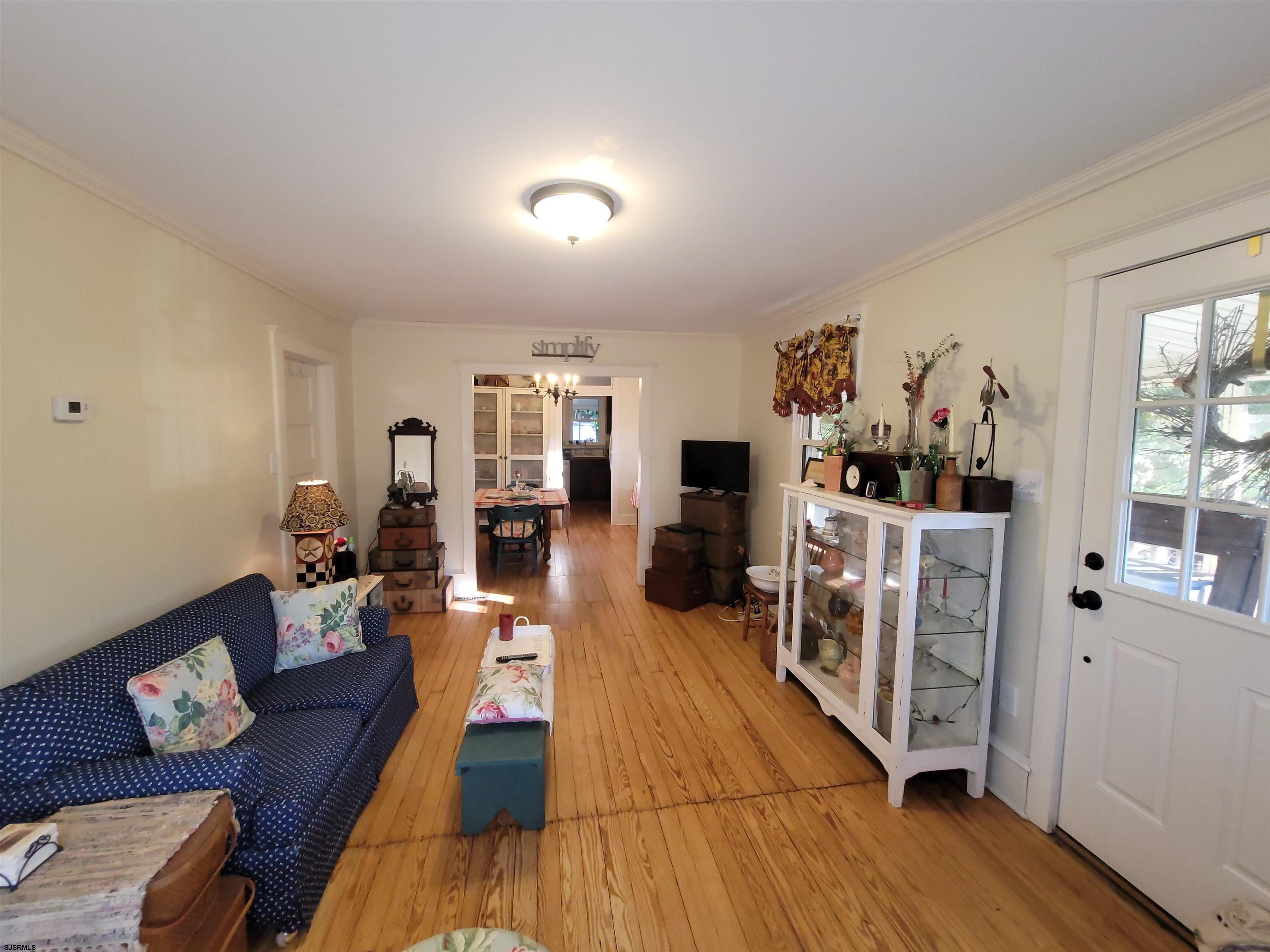 804 2nd Street Somers Point, NJ 08244 - Photo 4 of 29 a living room with furniture and wooden floor