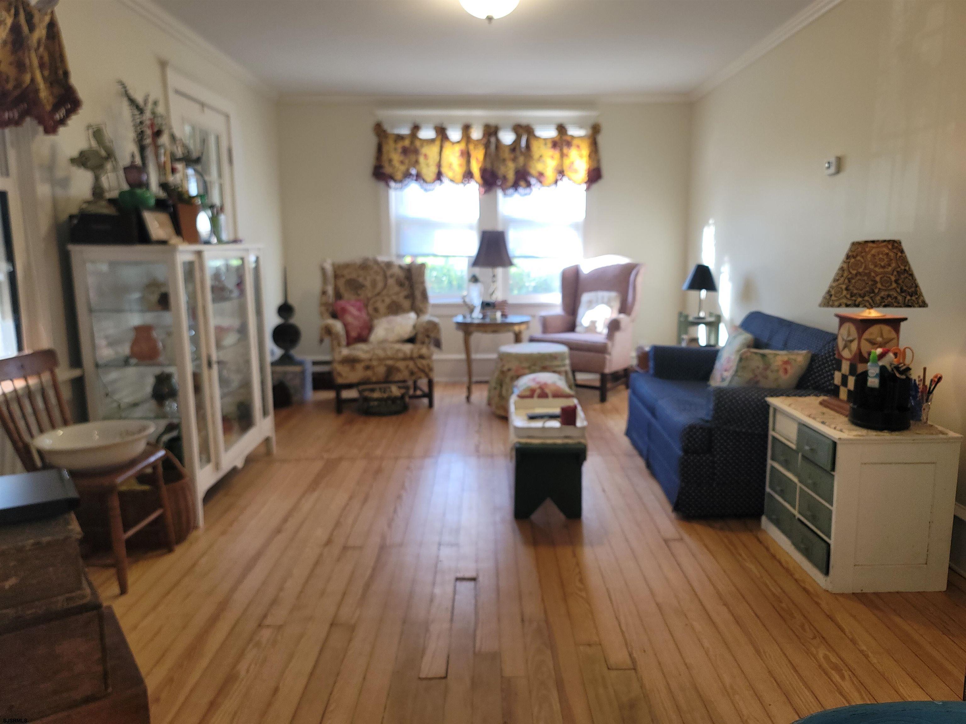 804 2nd Street Somers Point, NJ 08244 - Photo 5 of 29 a living room with furniture and a window