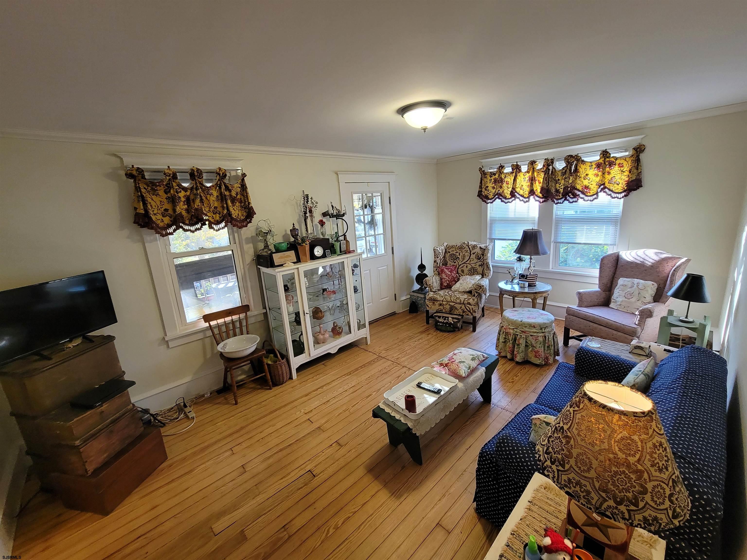 804 2nd Street Somers Point, NJ 08244 - Photo 6 of 29 a living room with furniture and a wooden floor