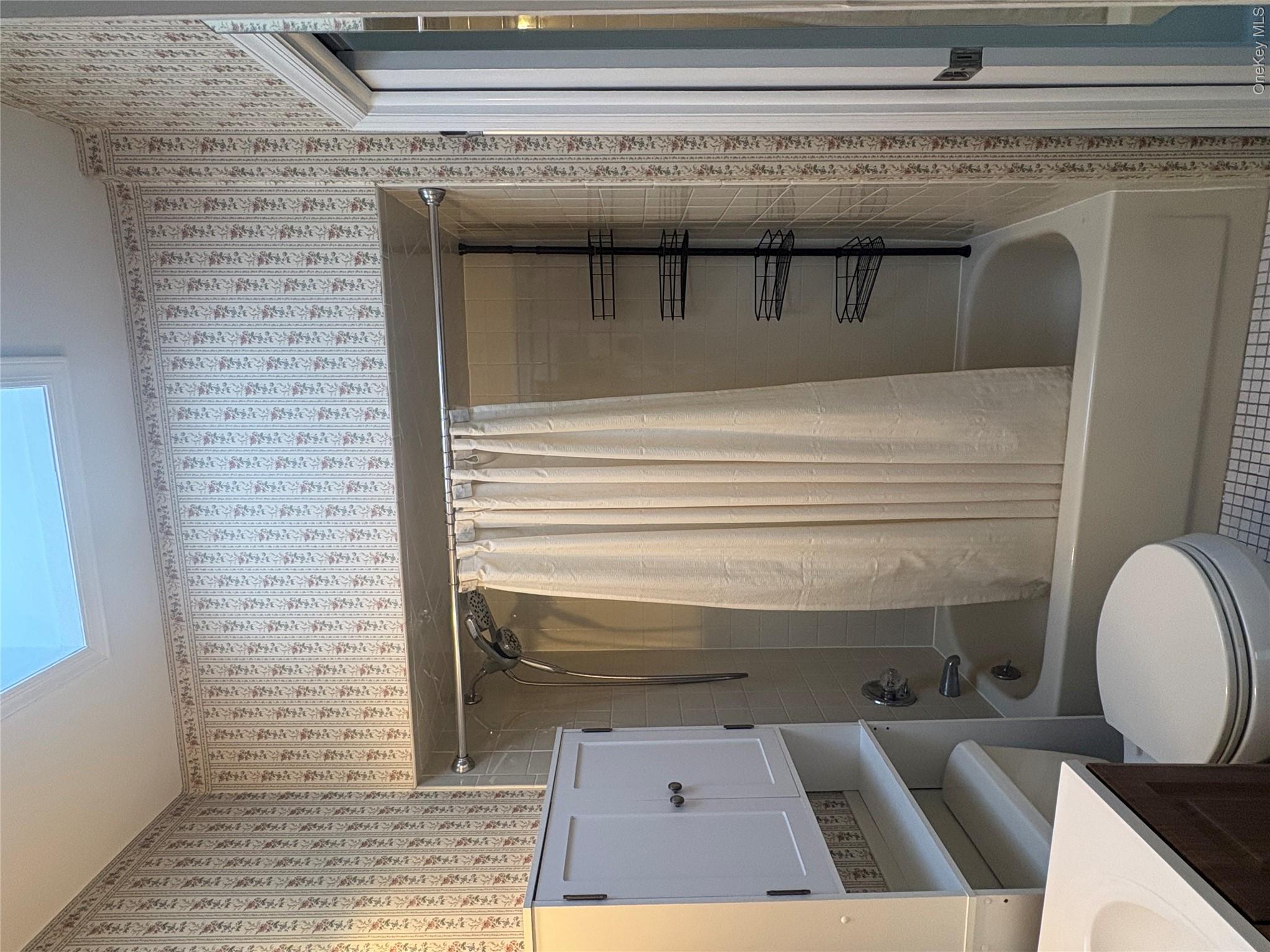 54 Old Brook Road Dix Hills, NY 11746 - Photo 11 of 15 a bathroom with a toilet and a shower